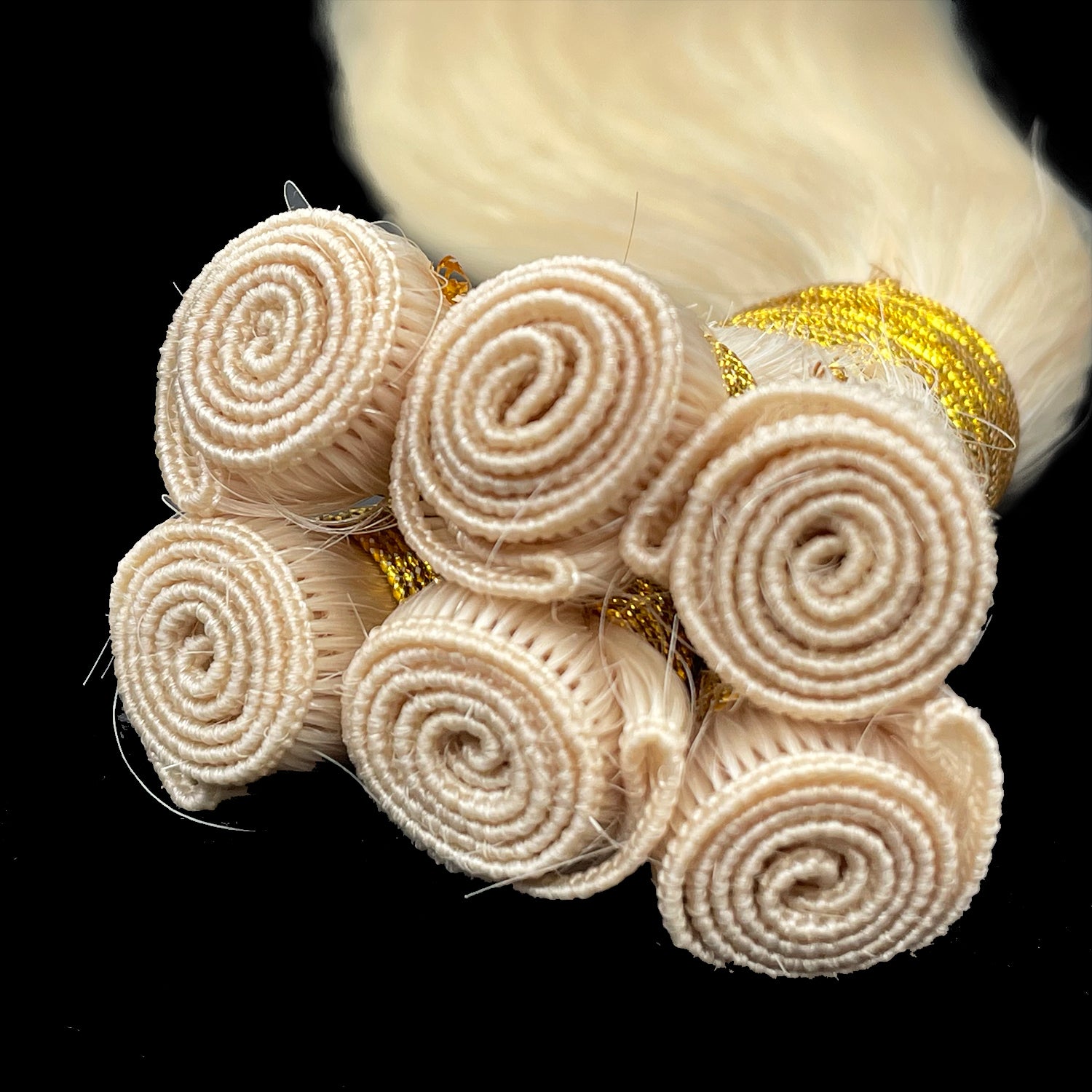 Cabello de trama atado a mano