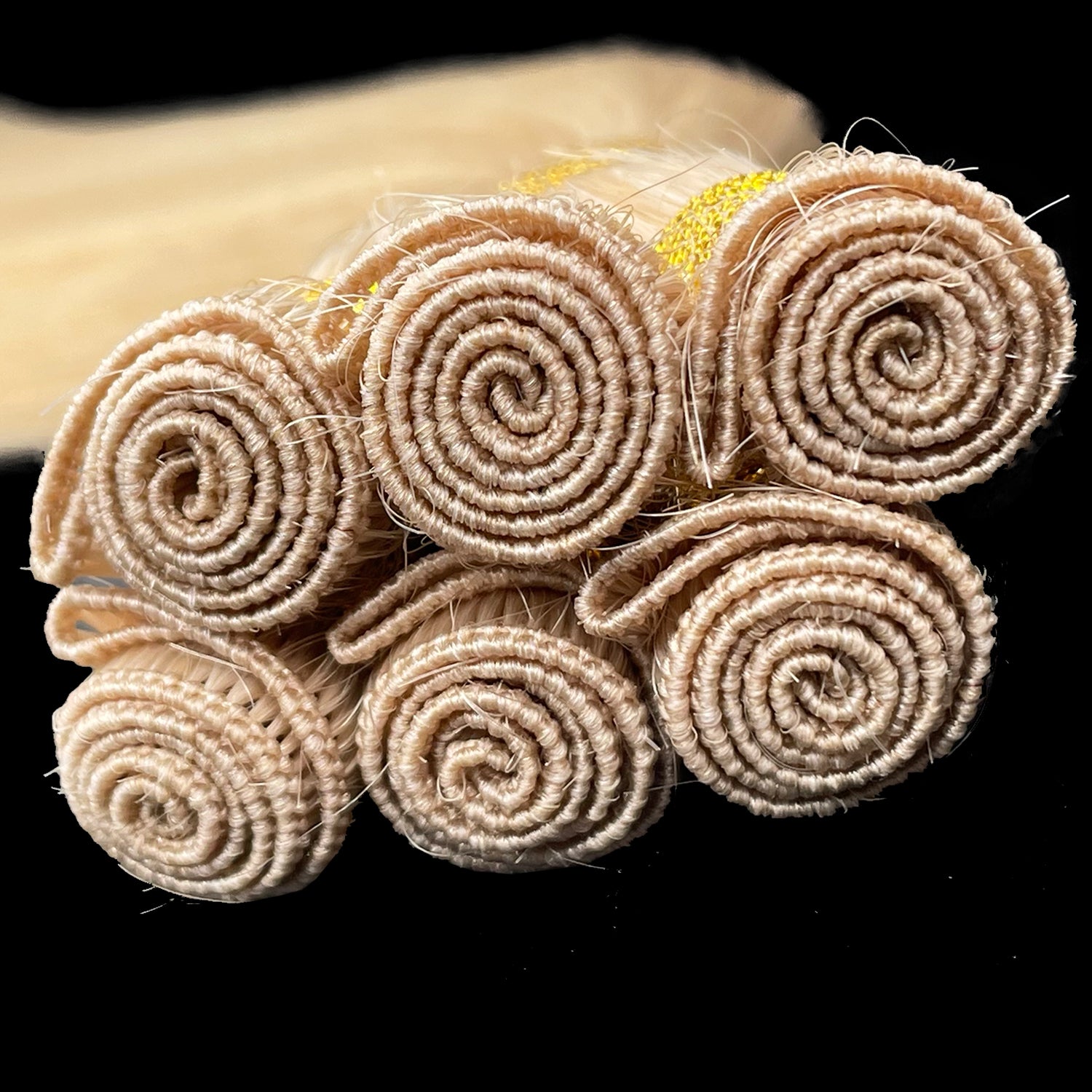 Pelo de trama atado a mano